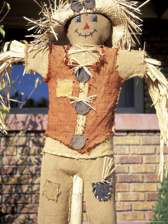 Scarecrow in Suburban Yard at Halloween, Logan, Utah, USA