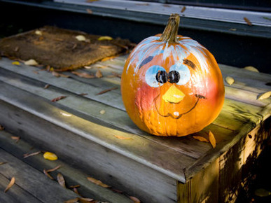 Painted Pumpkin on a Doorstep Celebrates Halloween