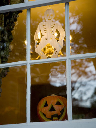 Halloween Decorations in the Window of an Old Historic House