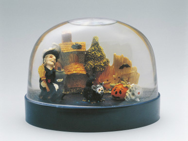 Close-Up of Figurines of Halloween in a Snow Globe